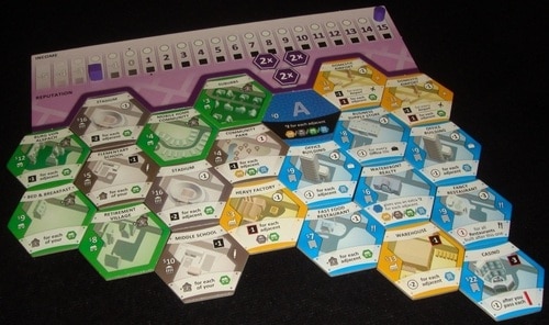 In Suburbia, players acquire tiles to create their own city, making players feel unique. Image from Board Game Geek.