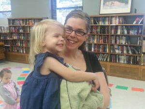 Start them young! Kelsey and our daughter, Addy, playing life-sized Candyland at our local library.